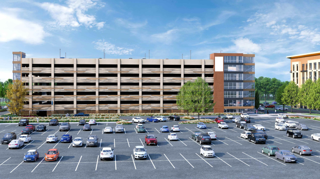 3D mockup of a seven-storey parkade building with an adjacent surface parking lot.